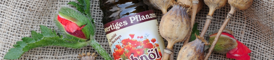 Mohnöl und Mohnblüten